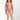Young girl wearing a pink patterned swimsuit on a white background