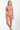 Woman wearing a coral bikini on a white background