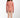 Child wearing a pink patterned bodysuit on a white background