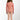 Child wearing a pink patterned bodysuit on a white background