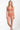 Woman wearing a peach-colored bikini set on a white background