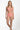 Woman wearing a coral patterned bikini set on a white background