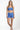Woman wearing a blue patterned swimsuit on a white background